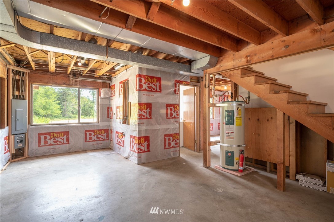 21429 Monument Road Southwest Vashon, WA 98070 - Photo 32 of 37 a view of a room with large windows