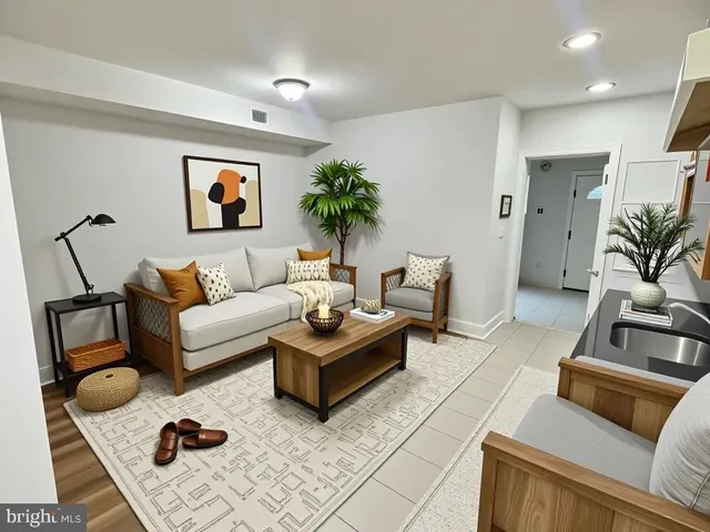 a living room with furniture and a couch