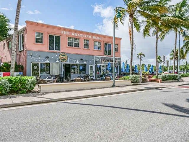 swimming pool with outdoor seating and yard