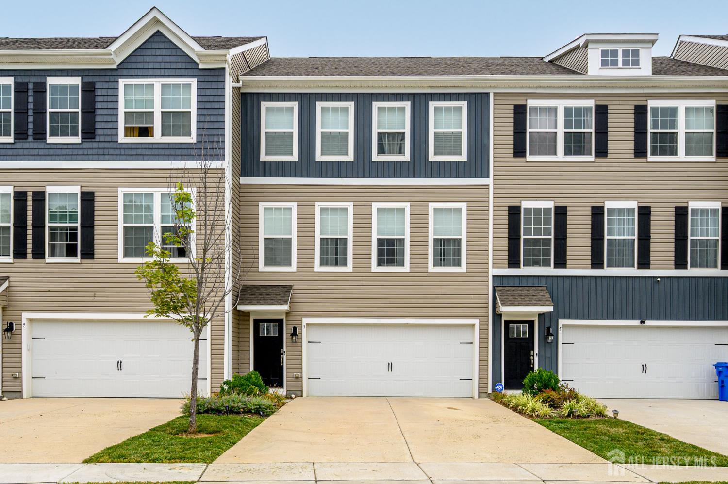 7 Foundry Blvd Mount Mount Holly, NJ 08060 - Photo 1 of 42 a front view of a house with a garden