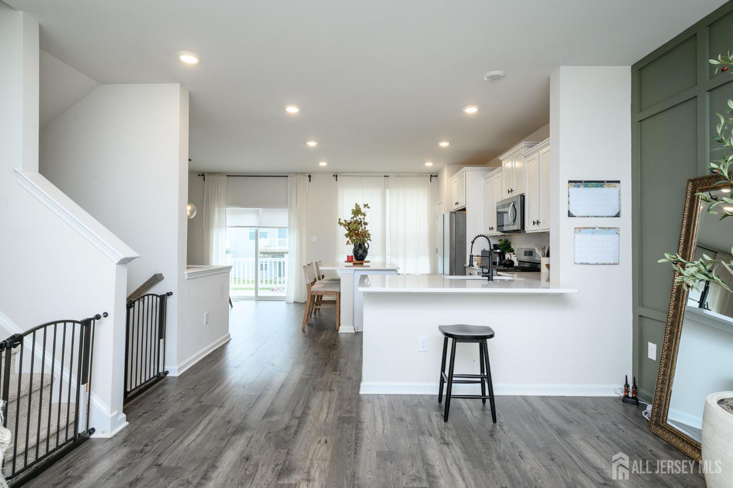 7 Foundry Blvd Mount Mount Holly, NJ 08060 - Photo 12 of 42 a kitchen with sink microwave and wooden floor