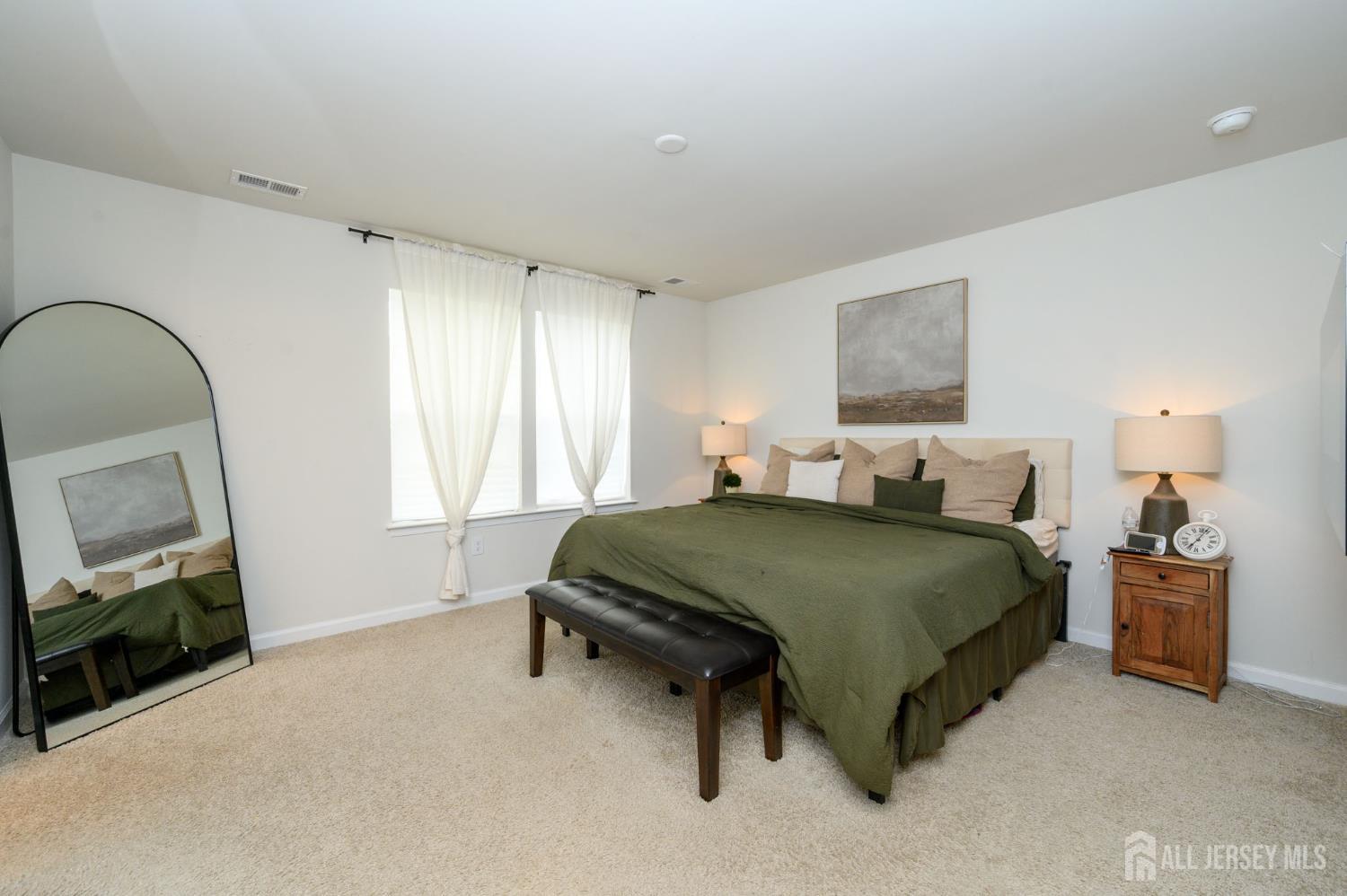 7 Foundry Blvd Mount Mount Holly, NJ 08060 - Photo 18 of 42 a bedroom with a bed and a television