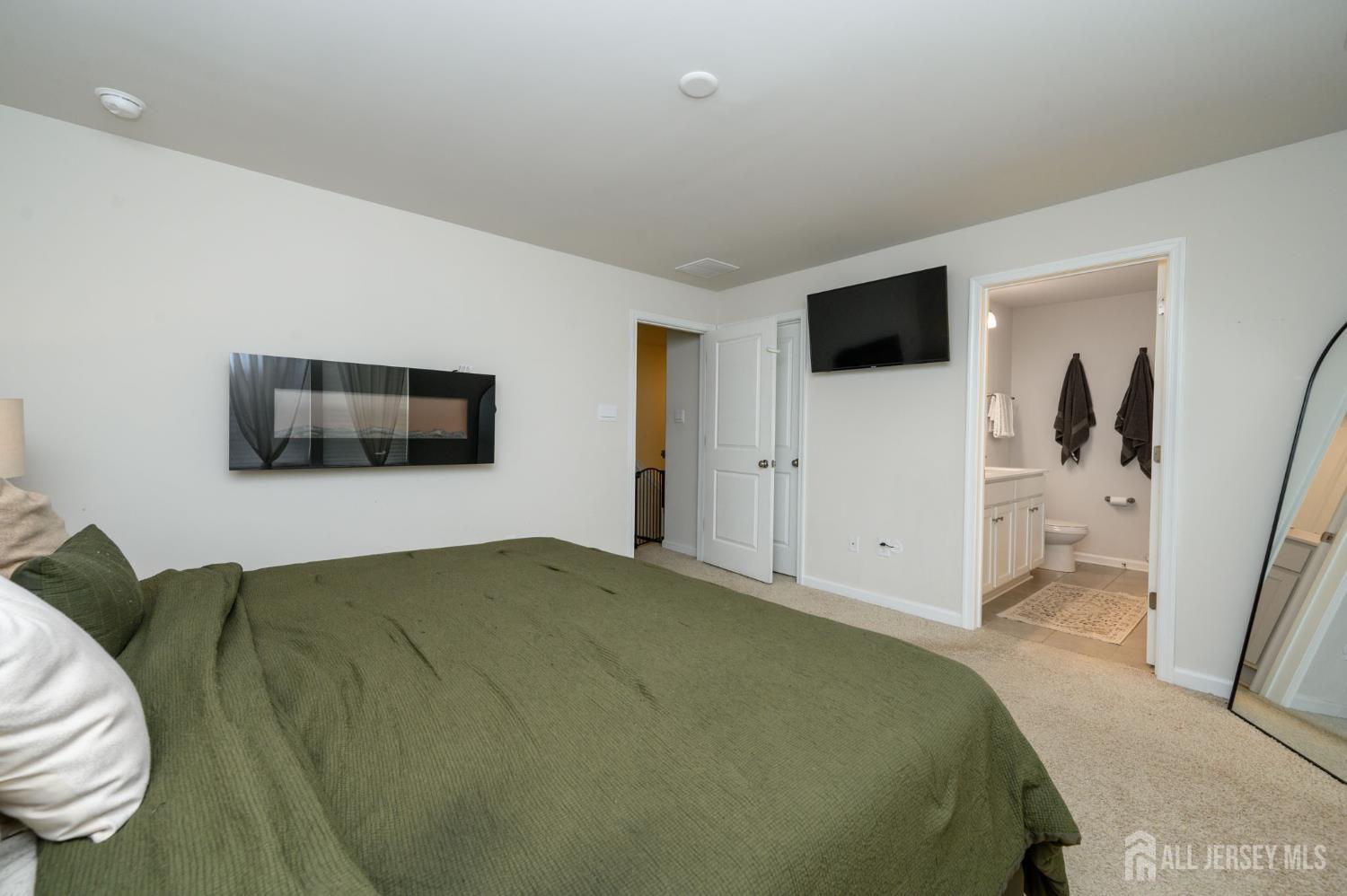 7 Foundry Blvd Mount Mount Holly, NJ 08060 - Photo 20 of 42 a bedroom with a bed and a television