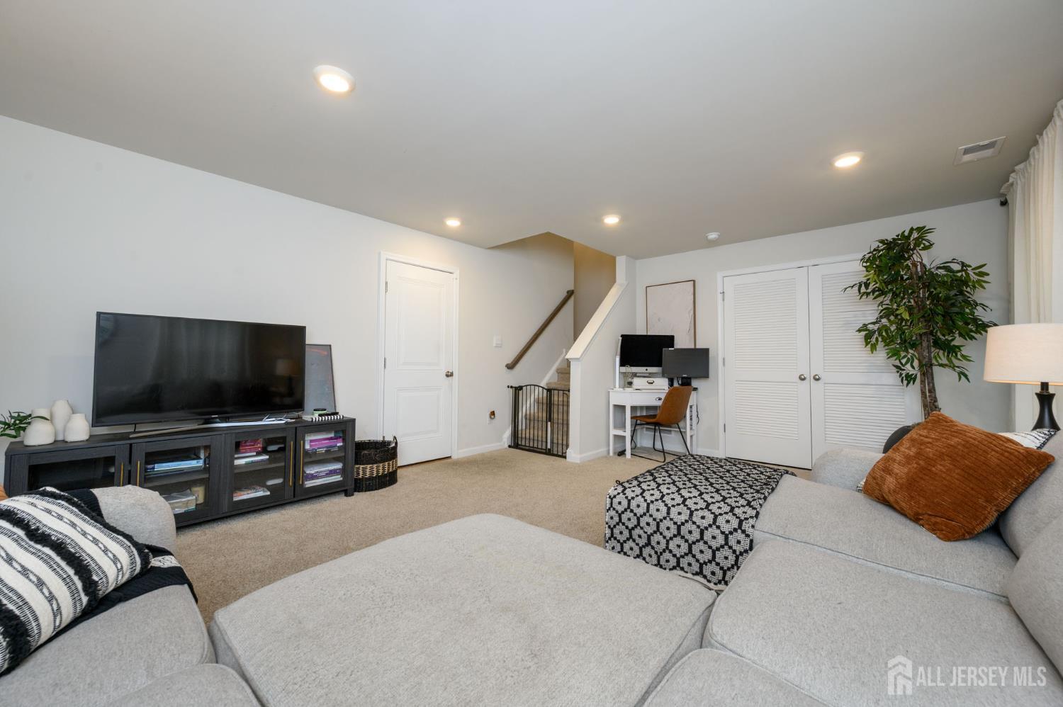 7 Foundry Blvd Mount Mount Holly, NJ 08060 - Photo 6 of 42 a living room with furniture and a flat screen tv