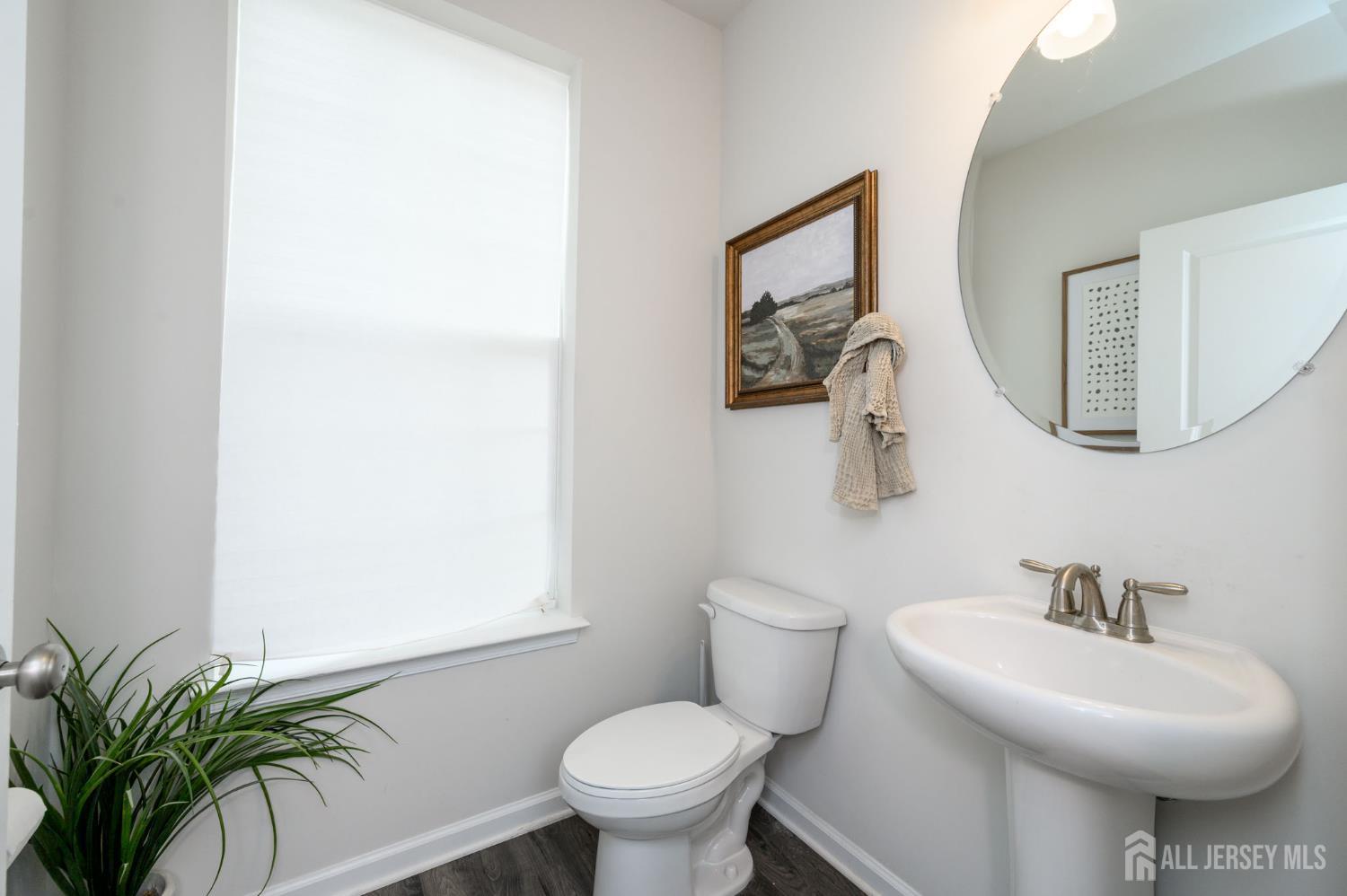 7 Foundry Blvd Mount Mount Holly, NJ 08060 - Photo 10 of 42 a bathroom with a toilet sink and mirror