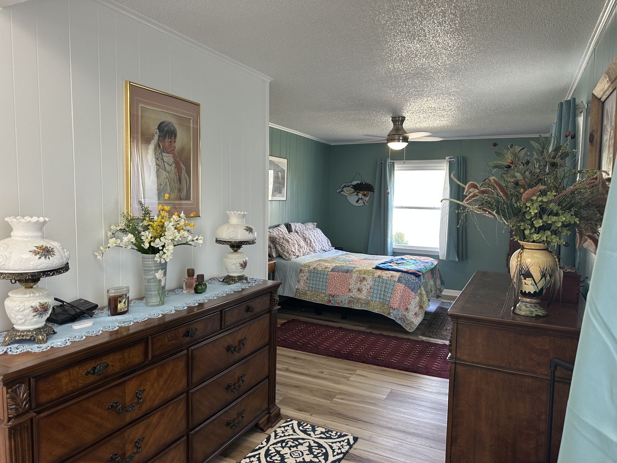 1900 Guthrie Road Paris, TN 38242 - Photo 11 of 36 a bedroom with a large bed and a window