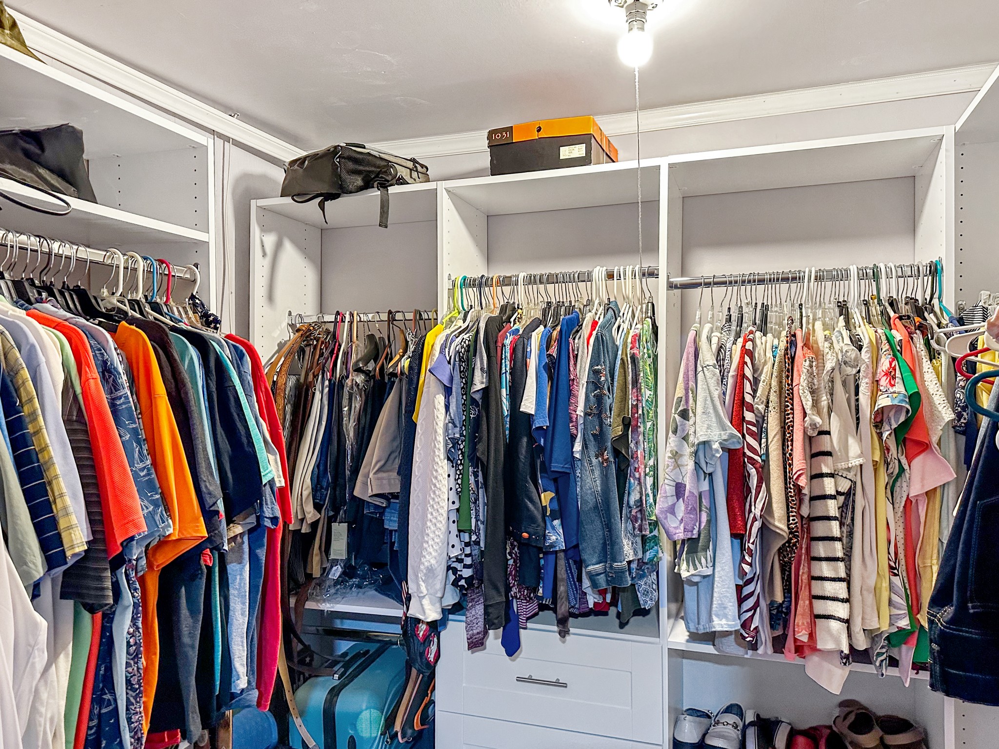 1900 Guthrie Road Paris, TN 38242 - Photo 22 of 36 a view of walk in closet with clothes
