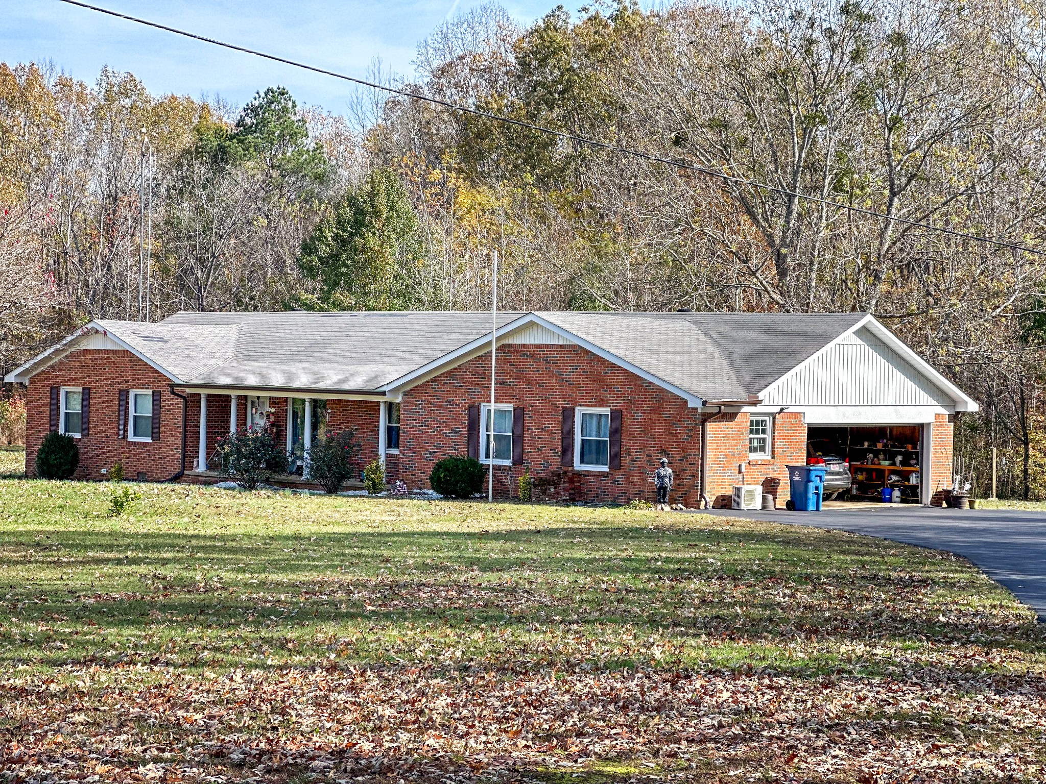 1900 Guthrie Road Paris, TN 38242 - Photo 28 of 36 a front view of a house with a yard