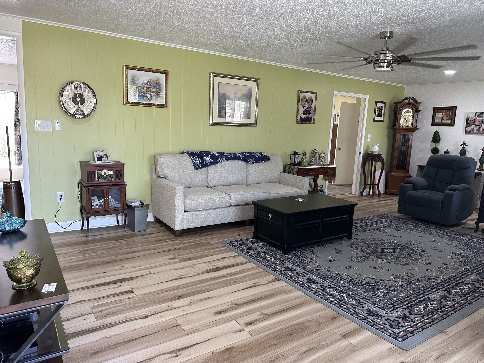 1900 Guthrie Road Paris, TN 38242 - Photo 4 of 36 a living room with furniture and wooden floor