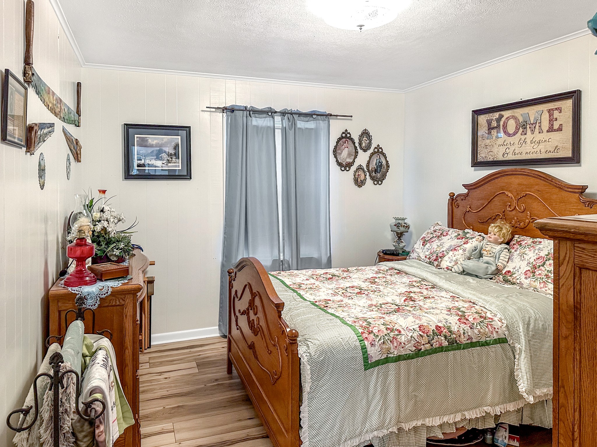 1900 Guthrie Road Paris, TN 38242 - Photo 7 of 36 a bedroom with a bed and a table in it