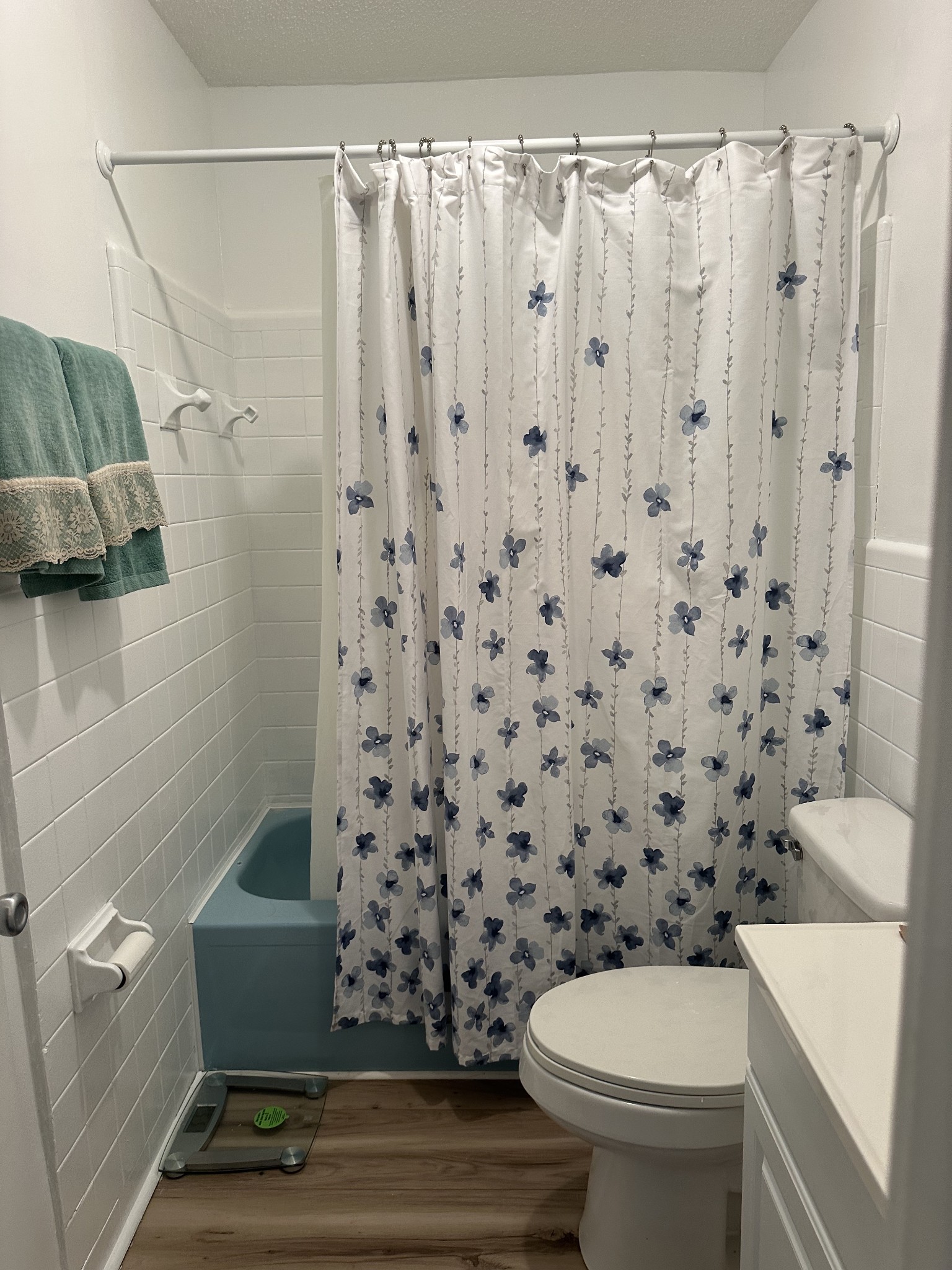 1900 Guthrie Road Paris, TN 38242 - Photo 9 of 36 a bathroom with a toilet and a shower curtain