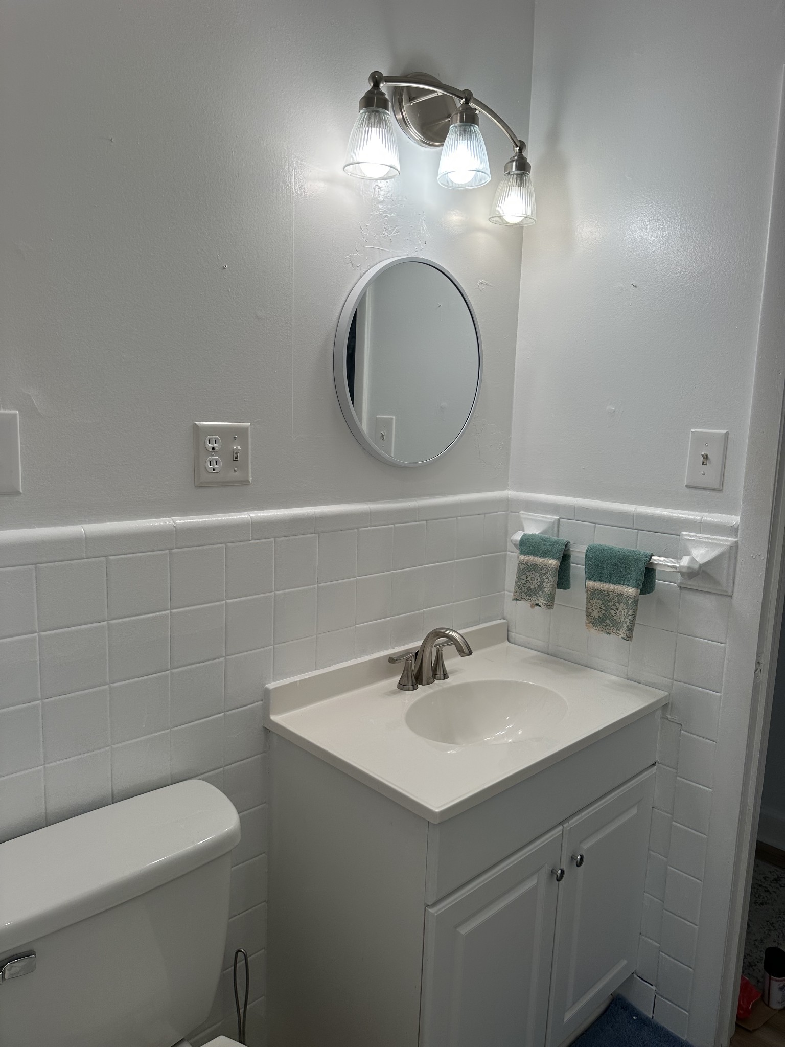 1900 Guthrie Road Paris, TN 38242 - Photo 10 of 36 a bathroom with a toilet sink and mirror