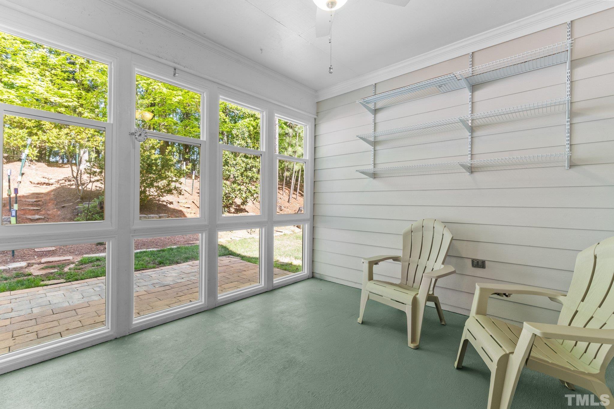 10507 Dapping Drive Raleigh, NC 27614 - Photo 24 of 38 a view of a room with chairs and iron gate