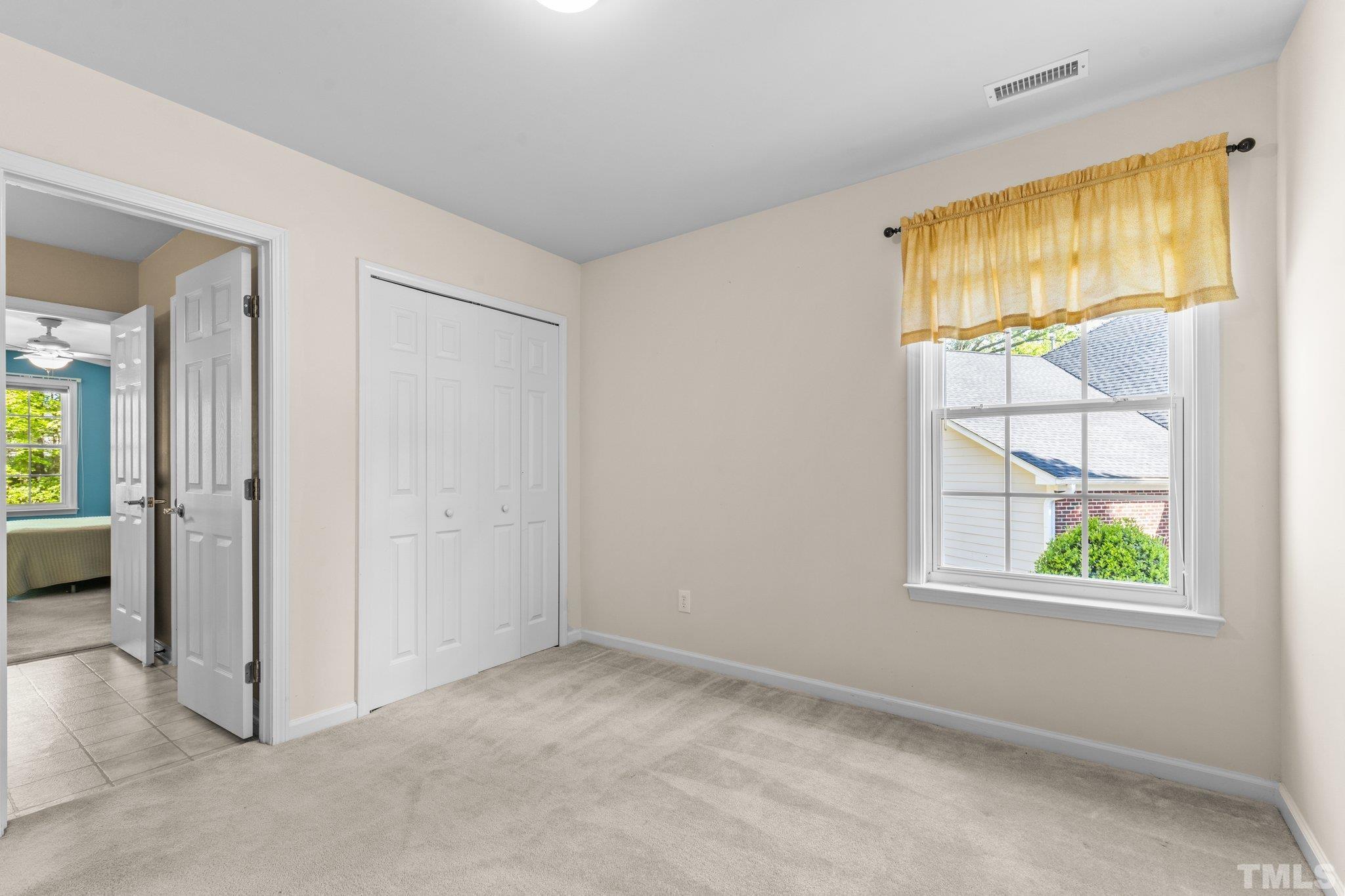 10507 Dapping Drive Raleigh, NC 27614 - Photo 27 of 38 an empty room with windows