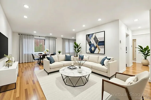 a living room with furniture or couch and a flat screen tv