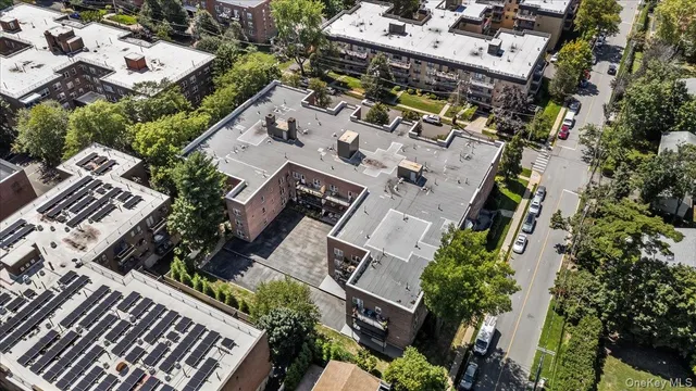 an aerial view of a city with lots of residential buildings