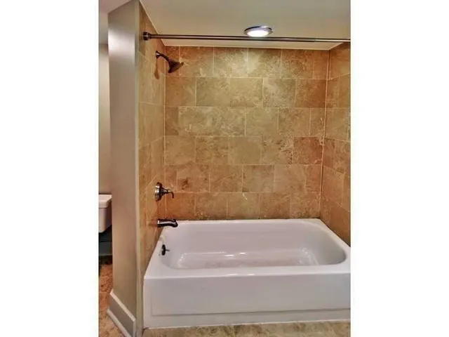 a bathroom with a bathtub