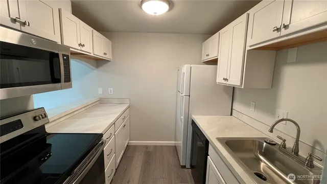 a bathroom with a toilet and a sink