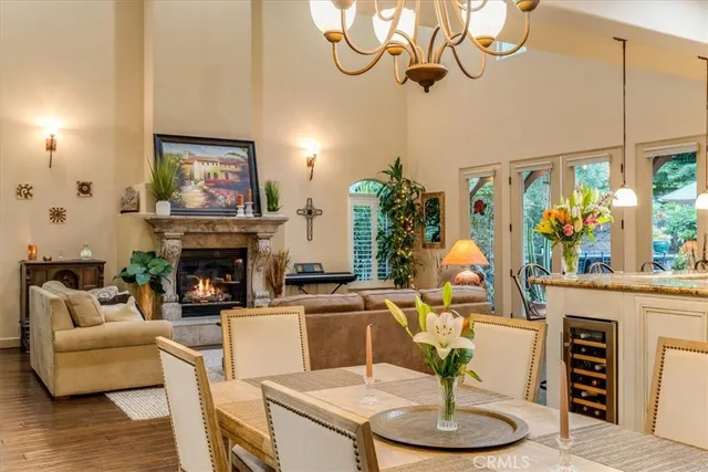 a bedroom with a bed a dresser and a large mirror