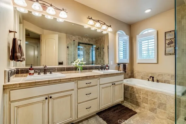 a view of backyard with seating space and trees