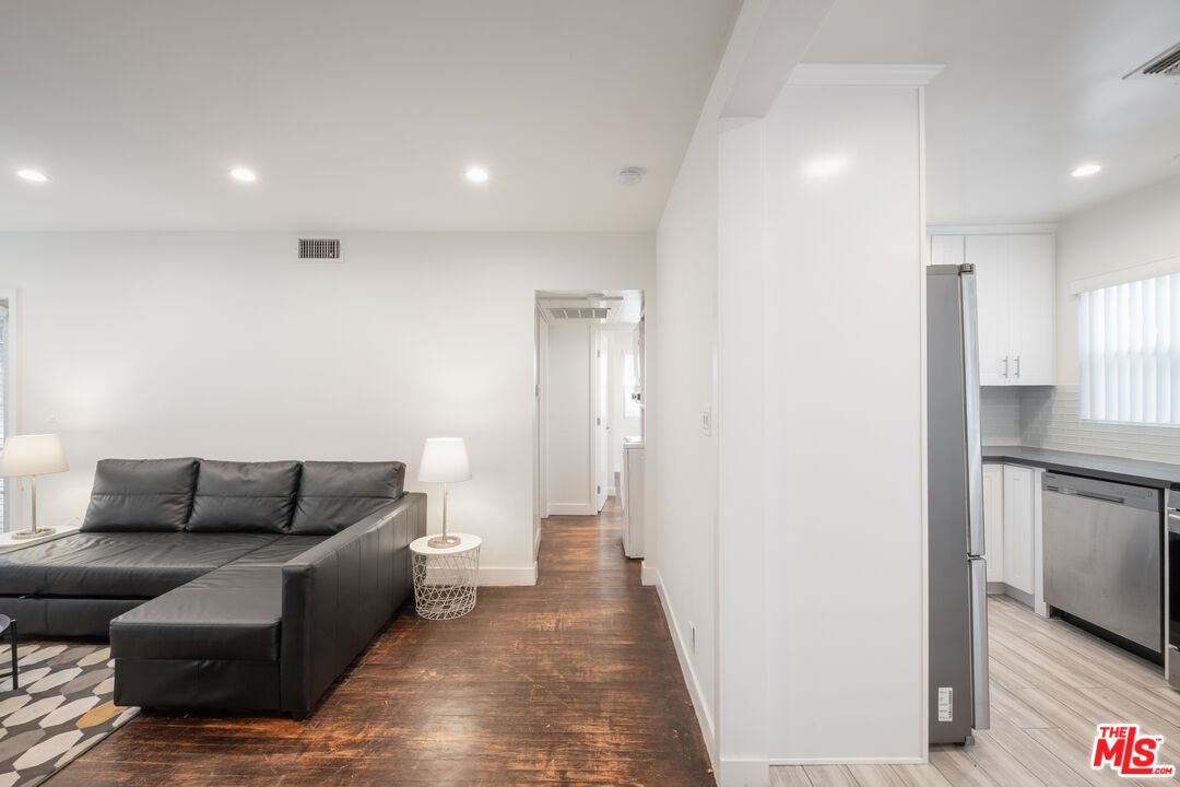 1024 Maple Street, Unit 1 Santa Monica, CA 90405 - Photo 9 of 16 a living room with furniture and a couch