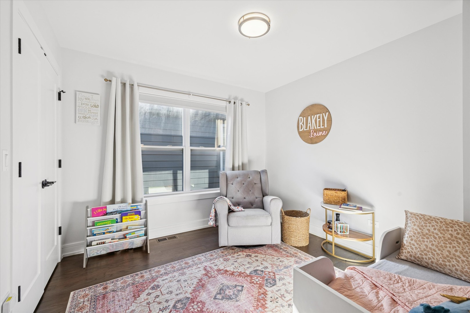 4744 South Indiana Avenue Chicago, IL 60615 - Photo 20 of 27 a living room with furniture and a window