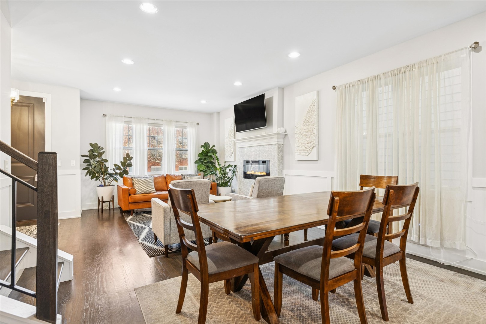 4744 South Indiana Avenue Chicago, IL 60615 - Photo 7 of 27 a view of a dining room with furniture and wooden floor