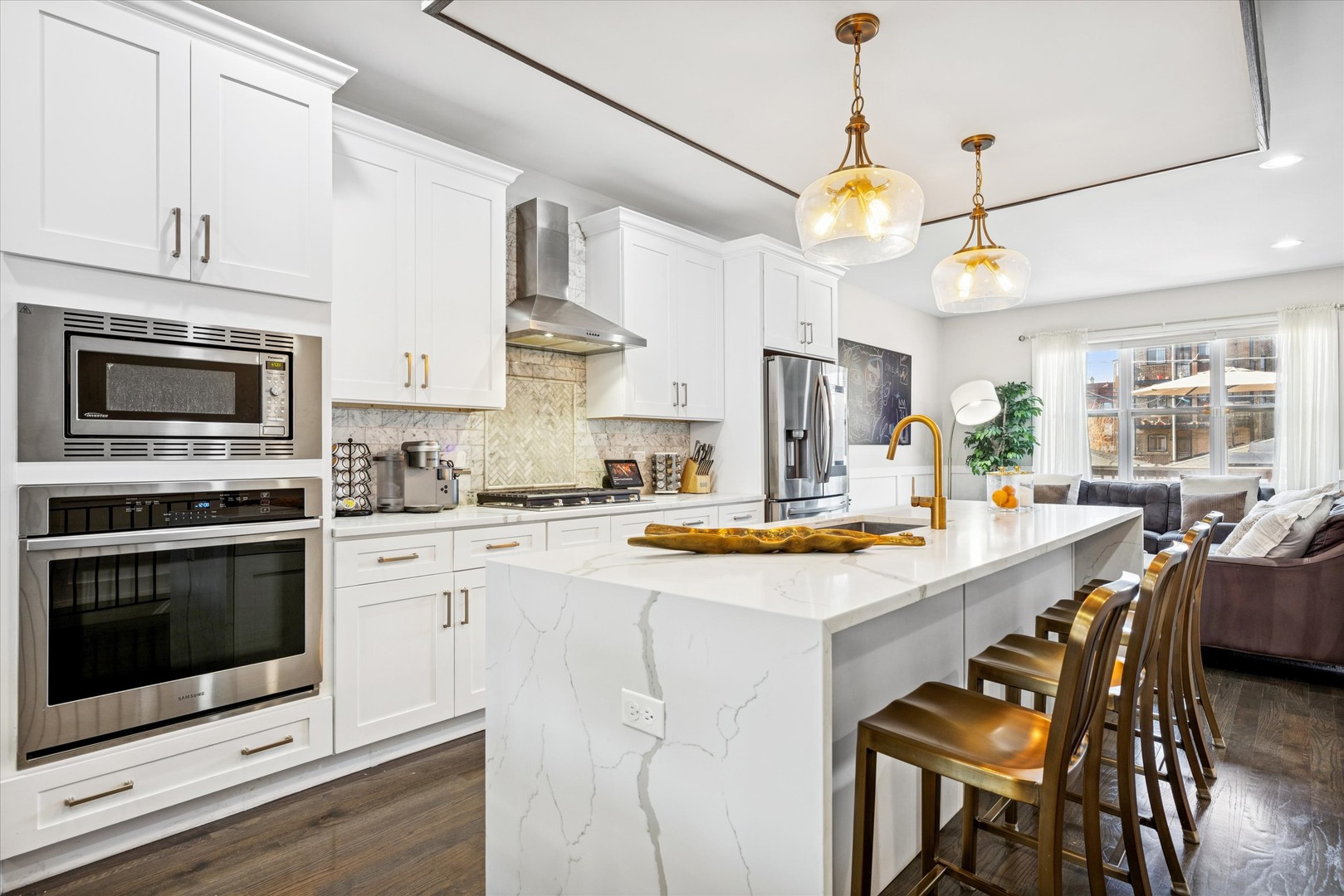 4744 South Indiana Avenue Chicago, IL 60615 - Photo 8 of 27 a kitchen with stainless steel appliances granite countertop a stove a sink and a refrigerator