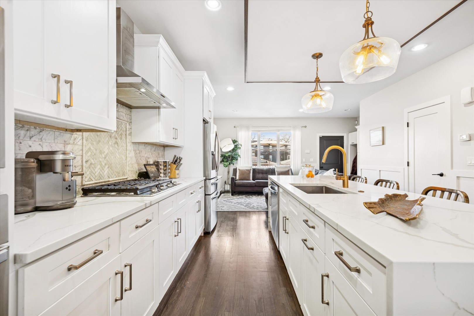 4744 South Indiana Avenue Chicago, IL 60615 - Photo 9 of 27 a kitchen with sink stove and cabinets