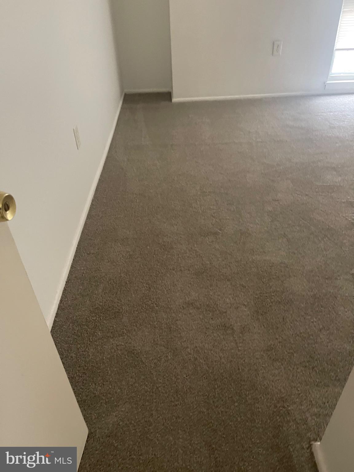 2360 Sun Valley Circle, Unit 2GH Silver Spring, MD 20906 - Photo 11 of 28 Spacious, inviting carpeted area awaits.