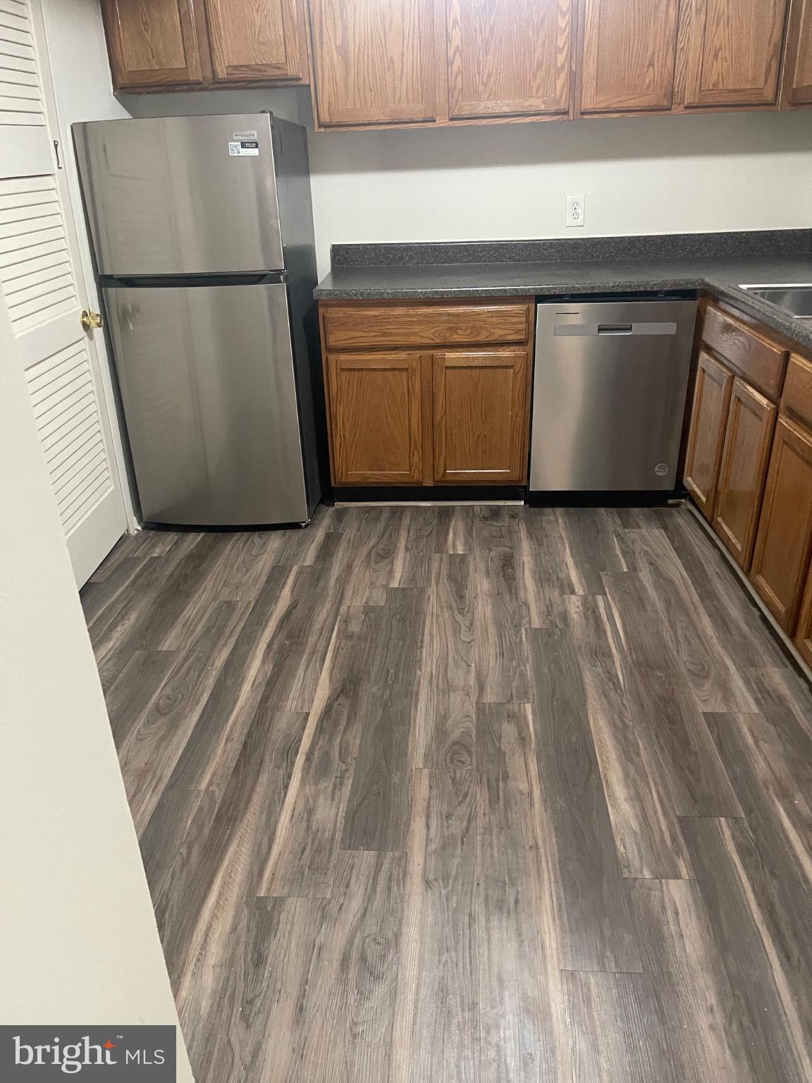 2360 Sun Valley Circle, Unit 2GH Silver Spring, MD 20906 - Photo 20 of 28 Modern kitchen with sleek appliances.