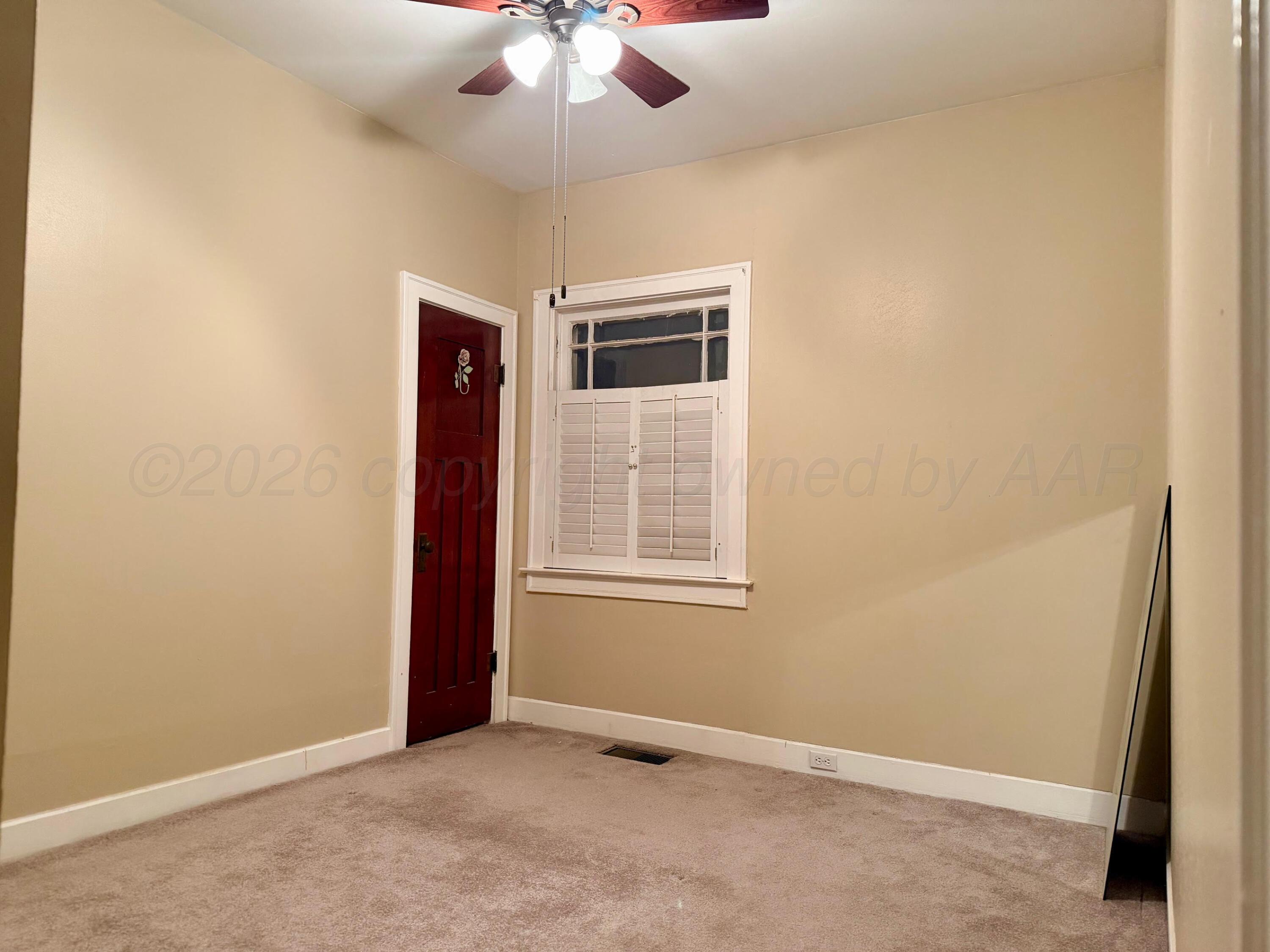 920 Montgomery Street Memphis, TX 79245 - Photo 15 of 30 an empty room with a window