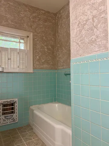 a bathroom with a bathtub