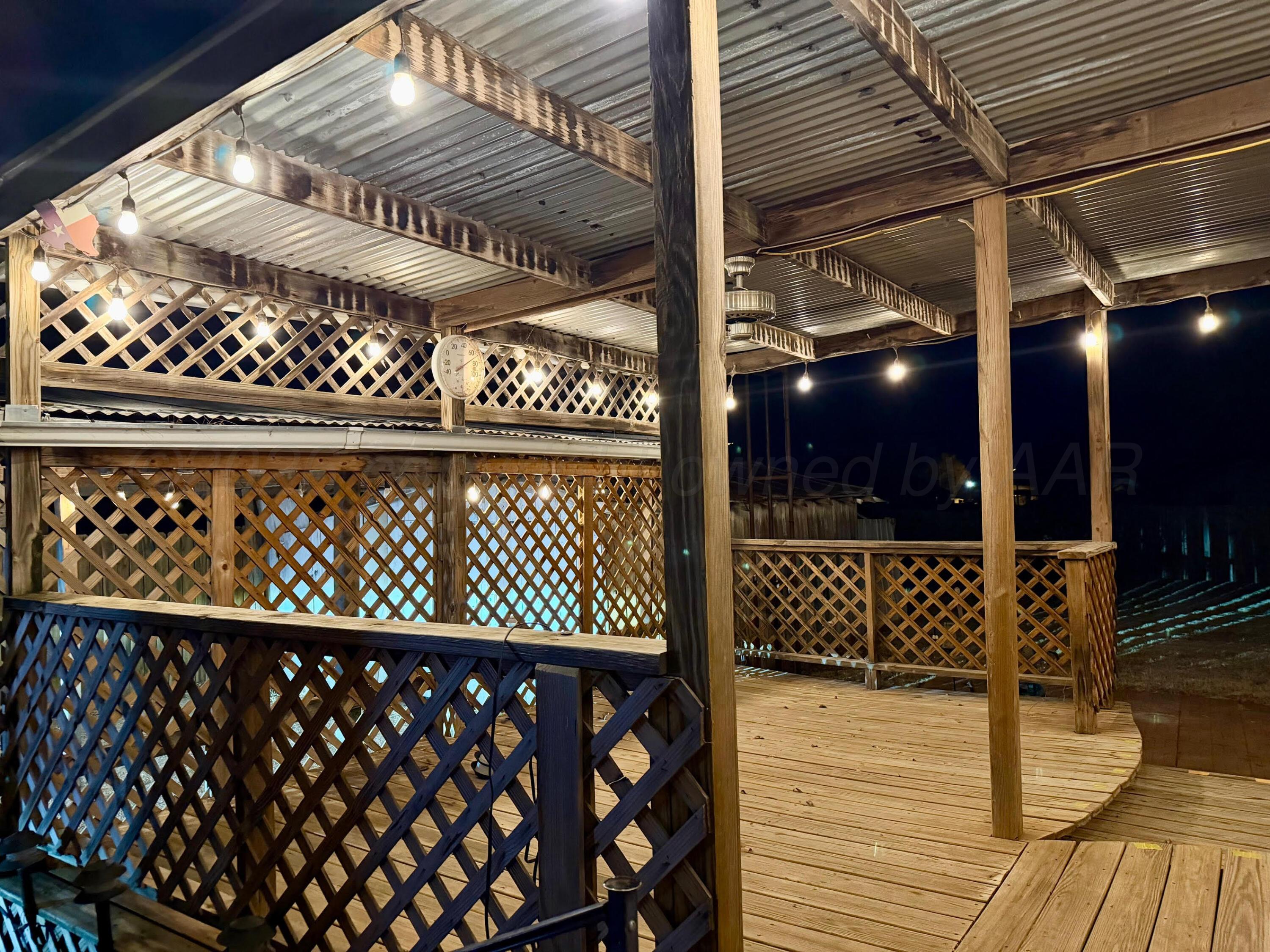 920 Montgomery Street Memphis, TX 79245 - Photo 24 of 30 a view of a wooden deck