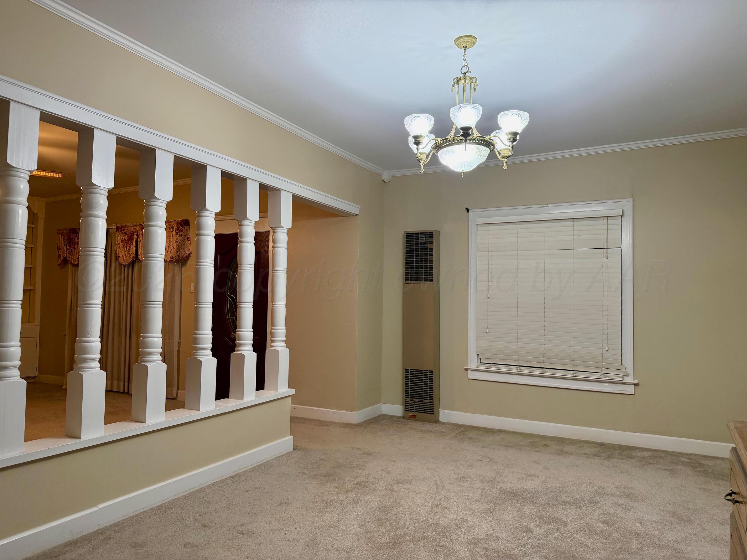 920 Montgomery Street Memphis, TX 79245 - Photo 5 of 30 a view of an empty room with a window