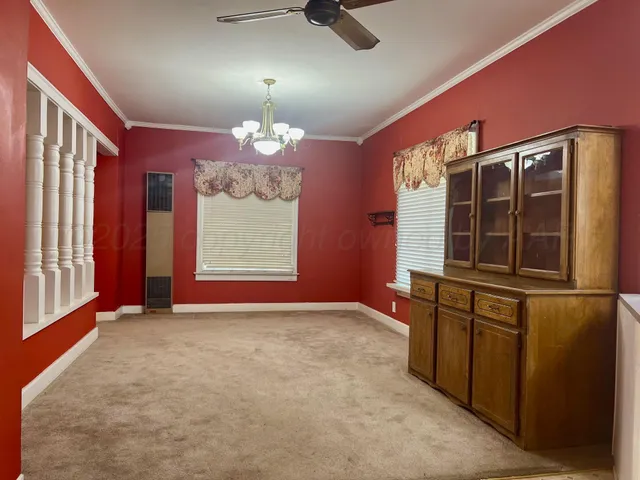 en empty room with windows