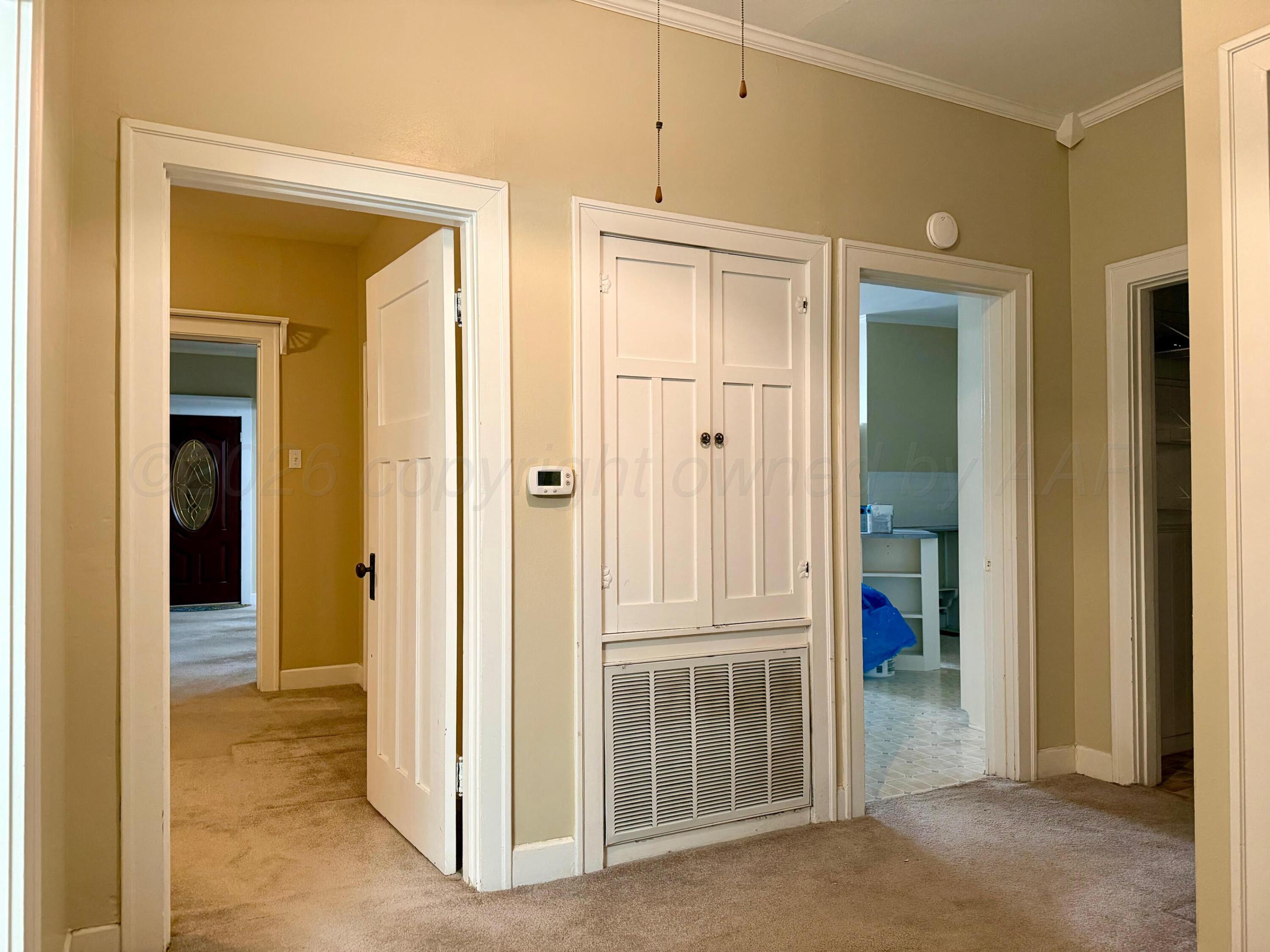 920 Montgomery Street Memphis, TX 79245 - Photo 10 of 30 a view of a hallway with closet area