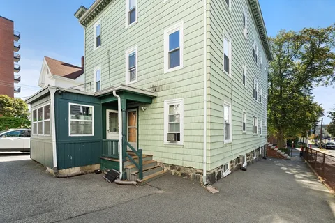 a view of a house with a garage