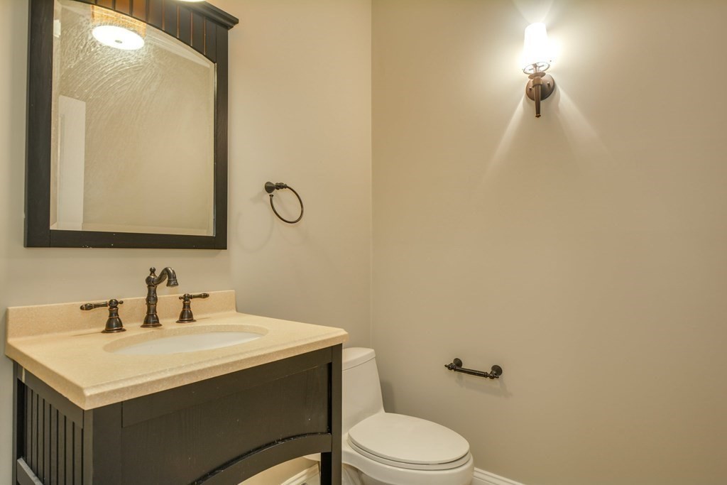 50 Tanglewood Road Newton, MA 02459 - Photo 3 of 42 a bathroom with a sink vanity mirror and toilet