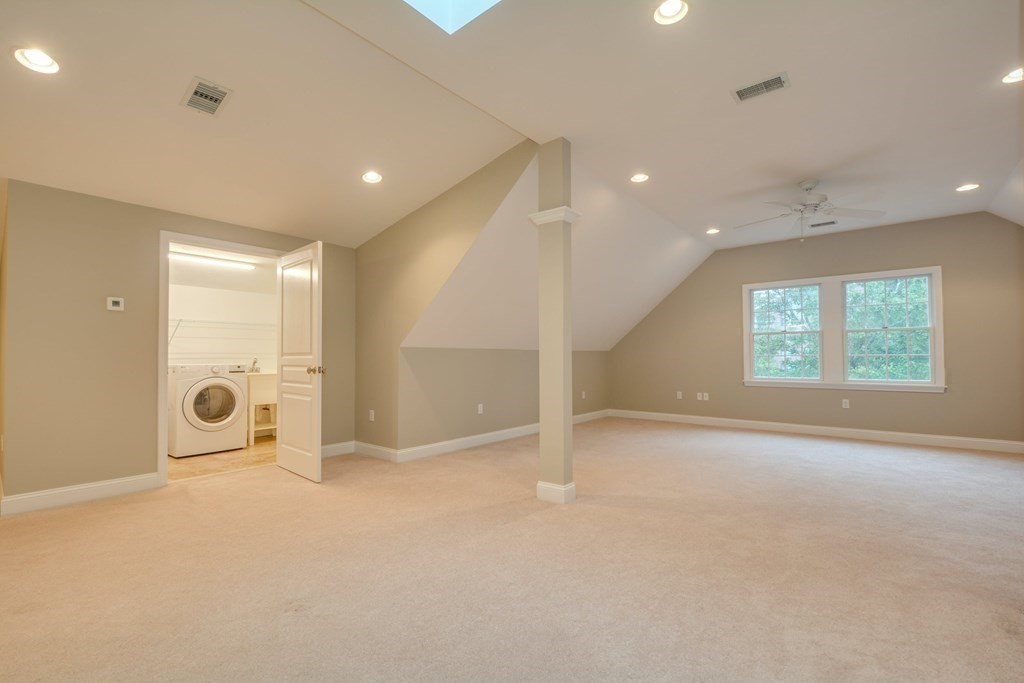 50 Tanglewood Road Newton, MA 02459 - Photo 31 of 42 an empty room with windows and entrance