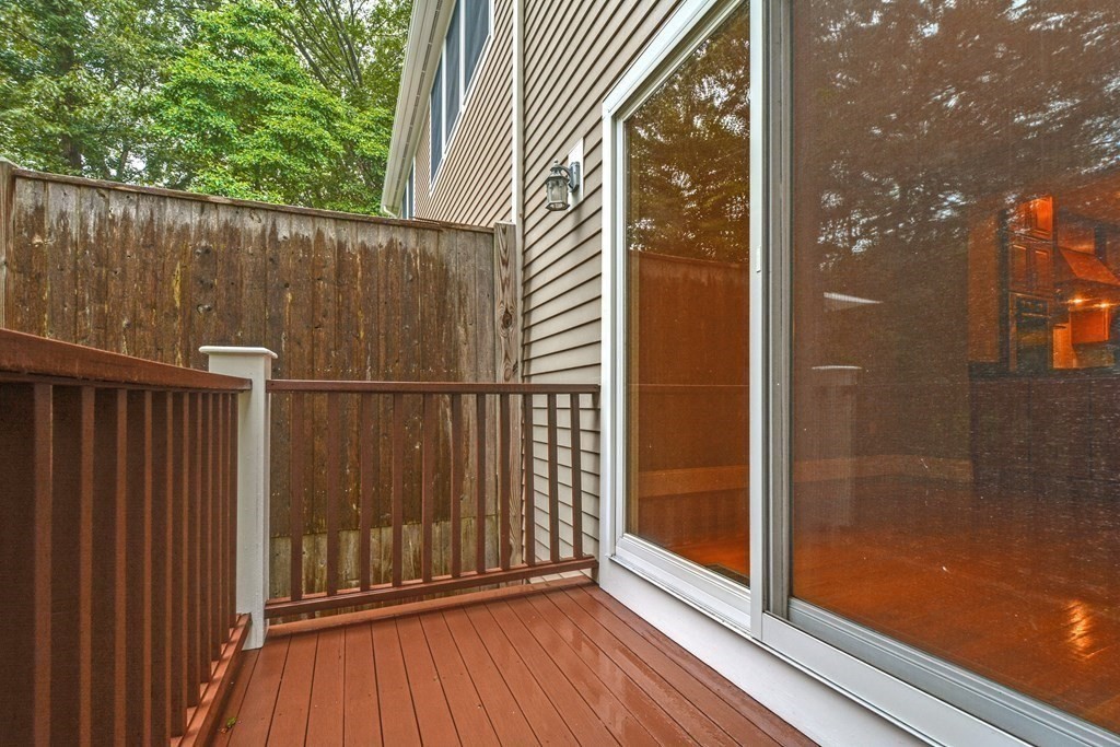 50 Tanglewood Road Newton, MA 02459 - Photo 36 of 42 a view of a balcony with wooden floor