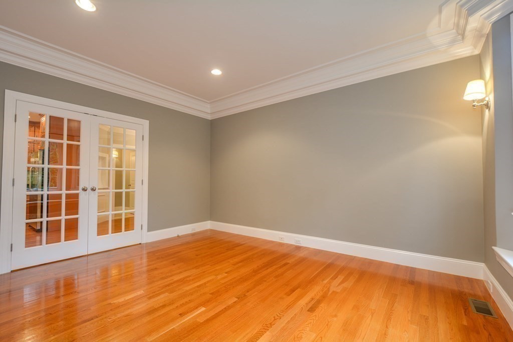 50 Tanglewood Road Newton, MA 02459 - Photo 5 of 42 a view of empty room with wooden floor and fan