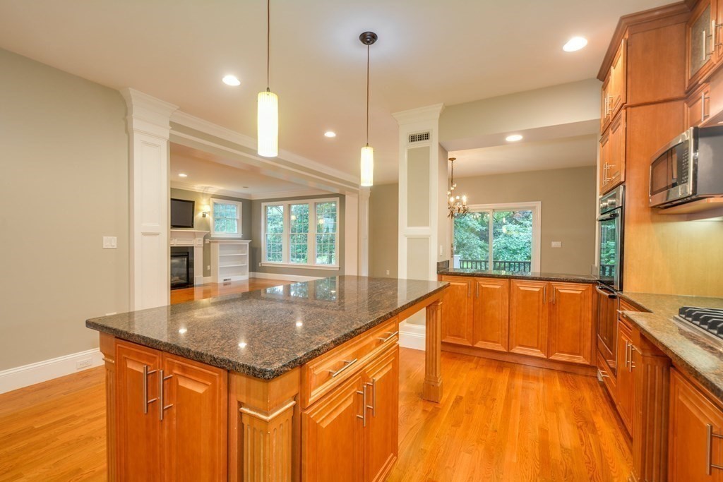50 Tanglewood Road Newton, MA 02459 - Photo 7 of 42 a view of a kitchen with a sink and large window
