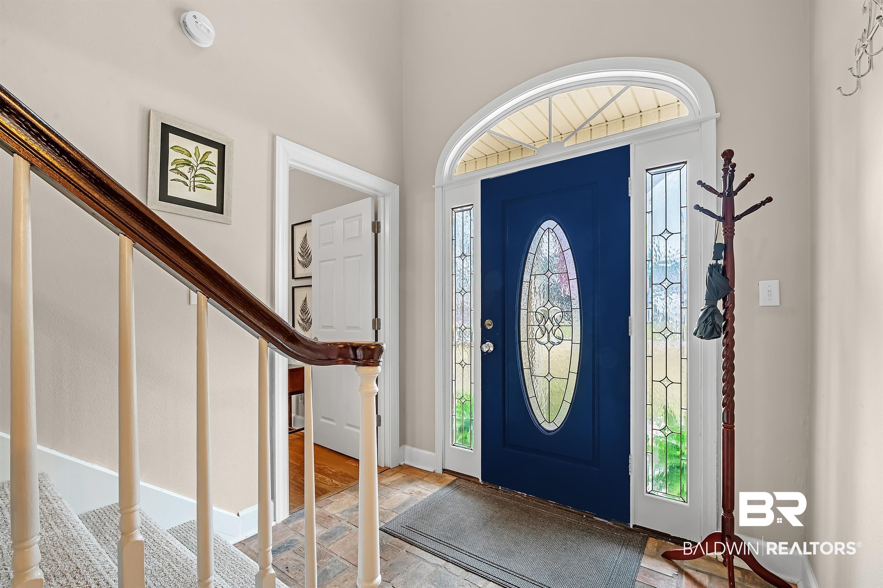 8915 Bay Point Drive Elberta, AL 36530 - Photo 8 of 74 Entryway featuring baseboards and stairs