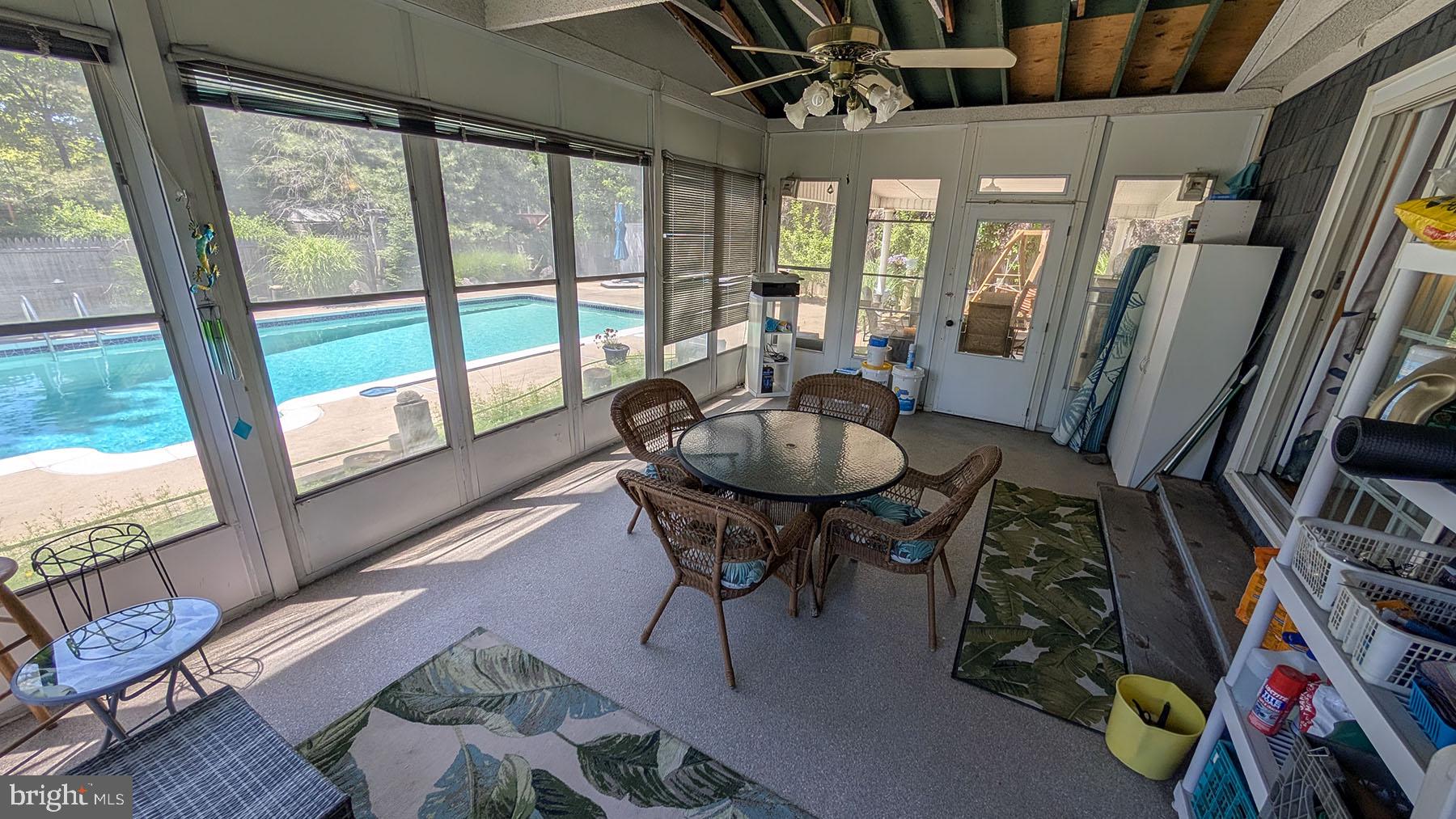 9 Wolfpack Road Hamilton, NJ 08619 - Photo 34 of 57 Serene sunroom with pool view.