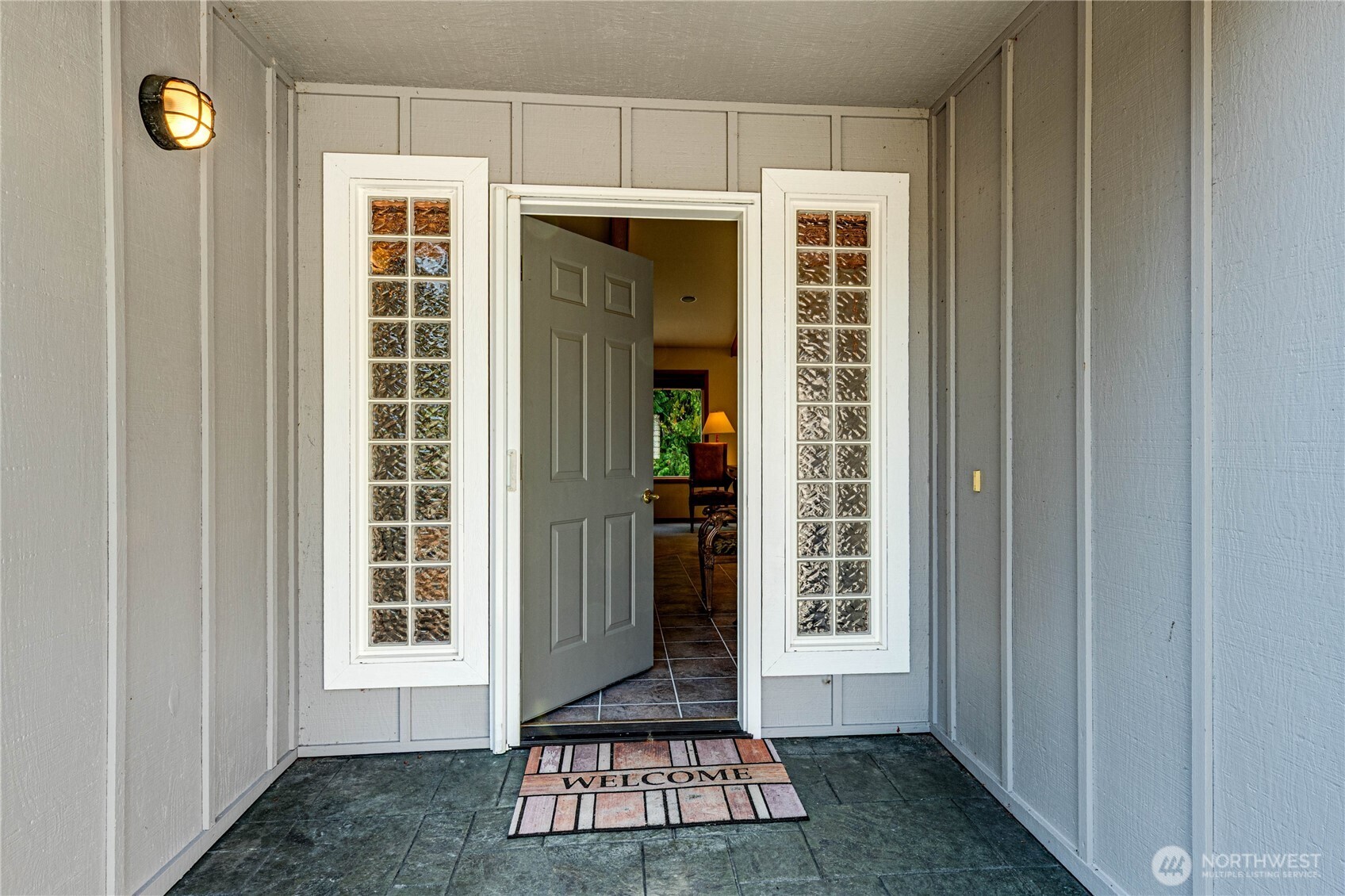 109 Vancouver Place Sequim, WA 98382 - Photo 2 of 40 a view of a door of a house with a window