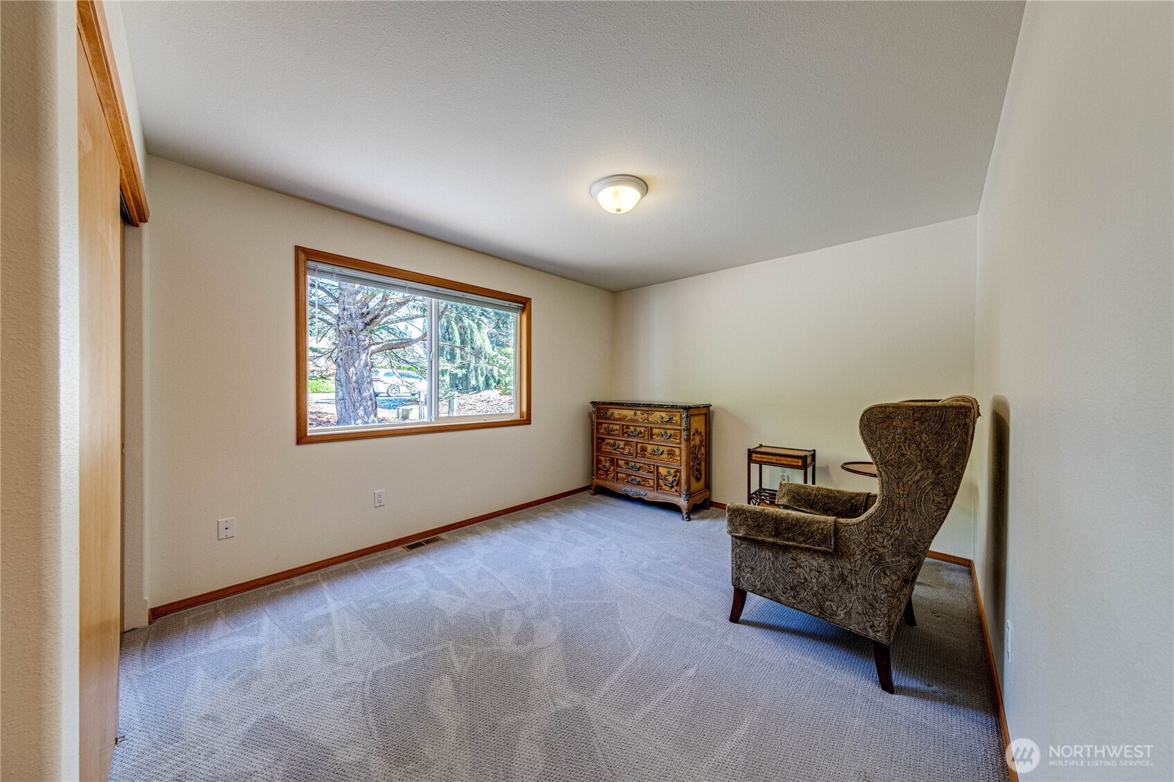 109 Vancouver Place Sequim, WA 98382 - Photo 23 of 40 a view of workspace with lounge chair and windows