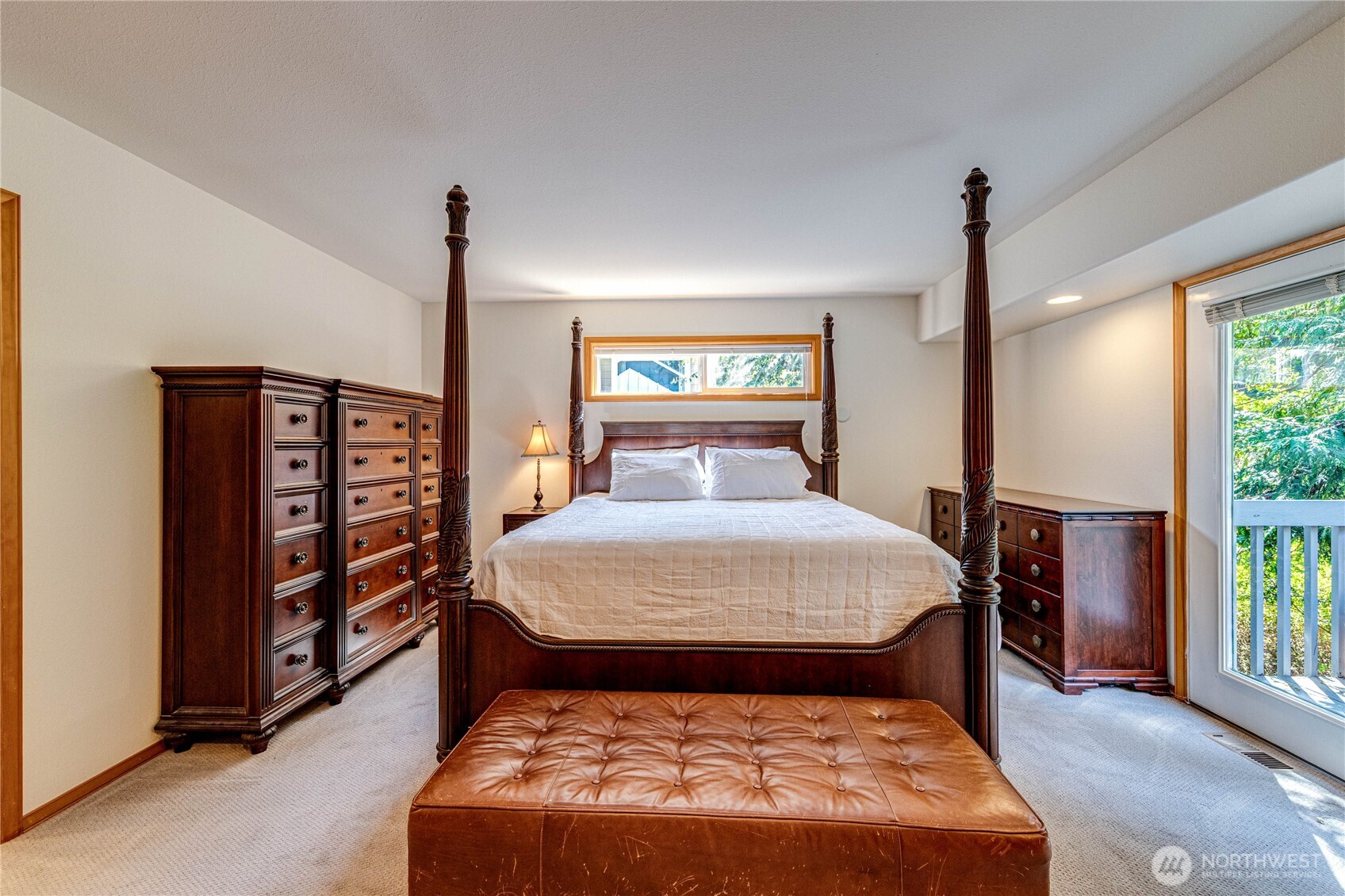 109 Vancouver Place Sequim, WA 98382 - Photo 24 of 40 a bed sitting in a bedroom next to a window