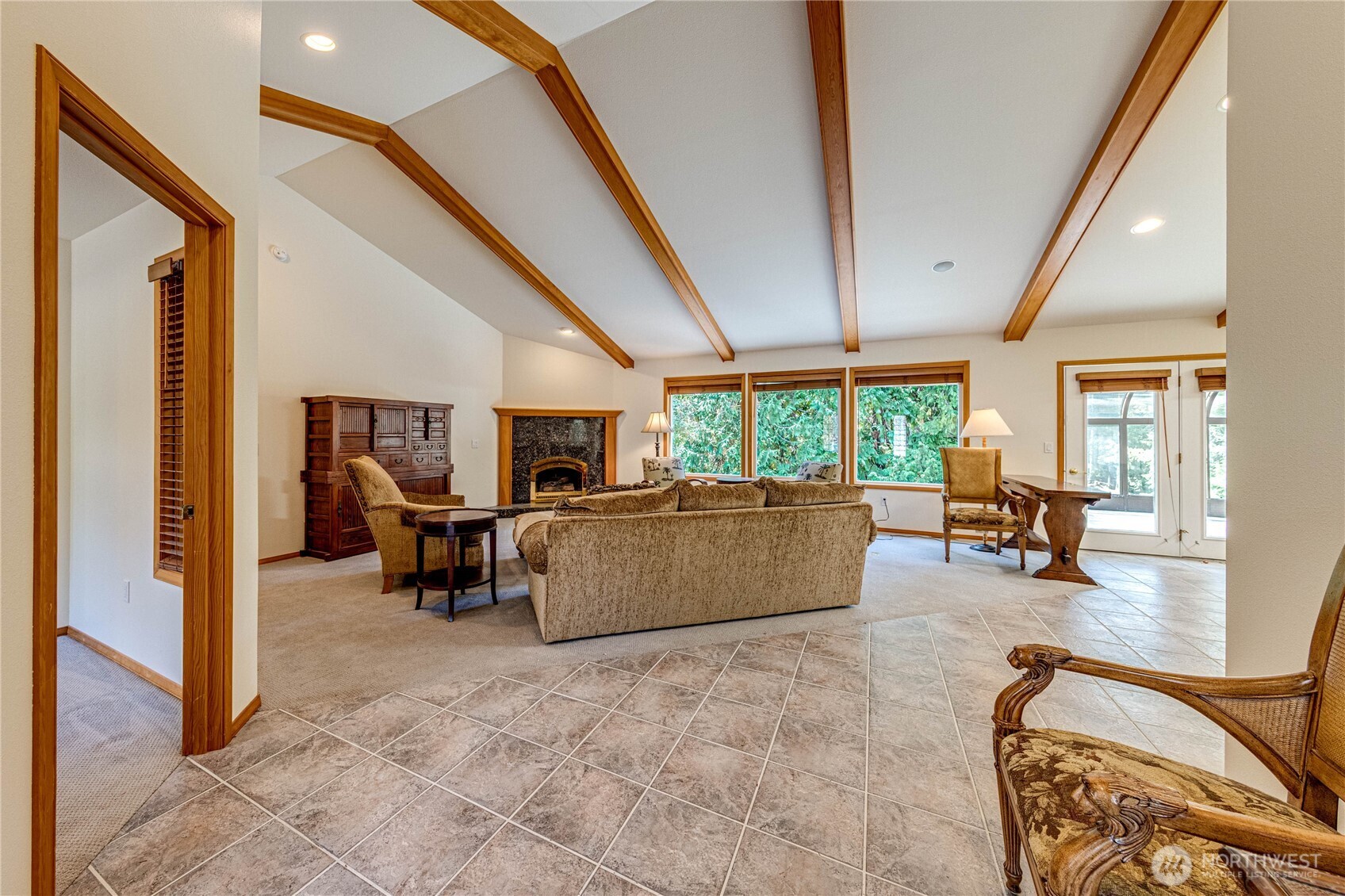 109 Vancouver Place Sequim, WA 98382 - Photo 4 of 40 a living room with furniture and a large window