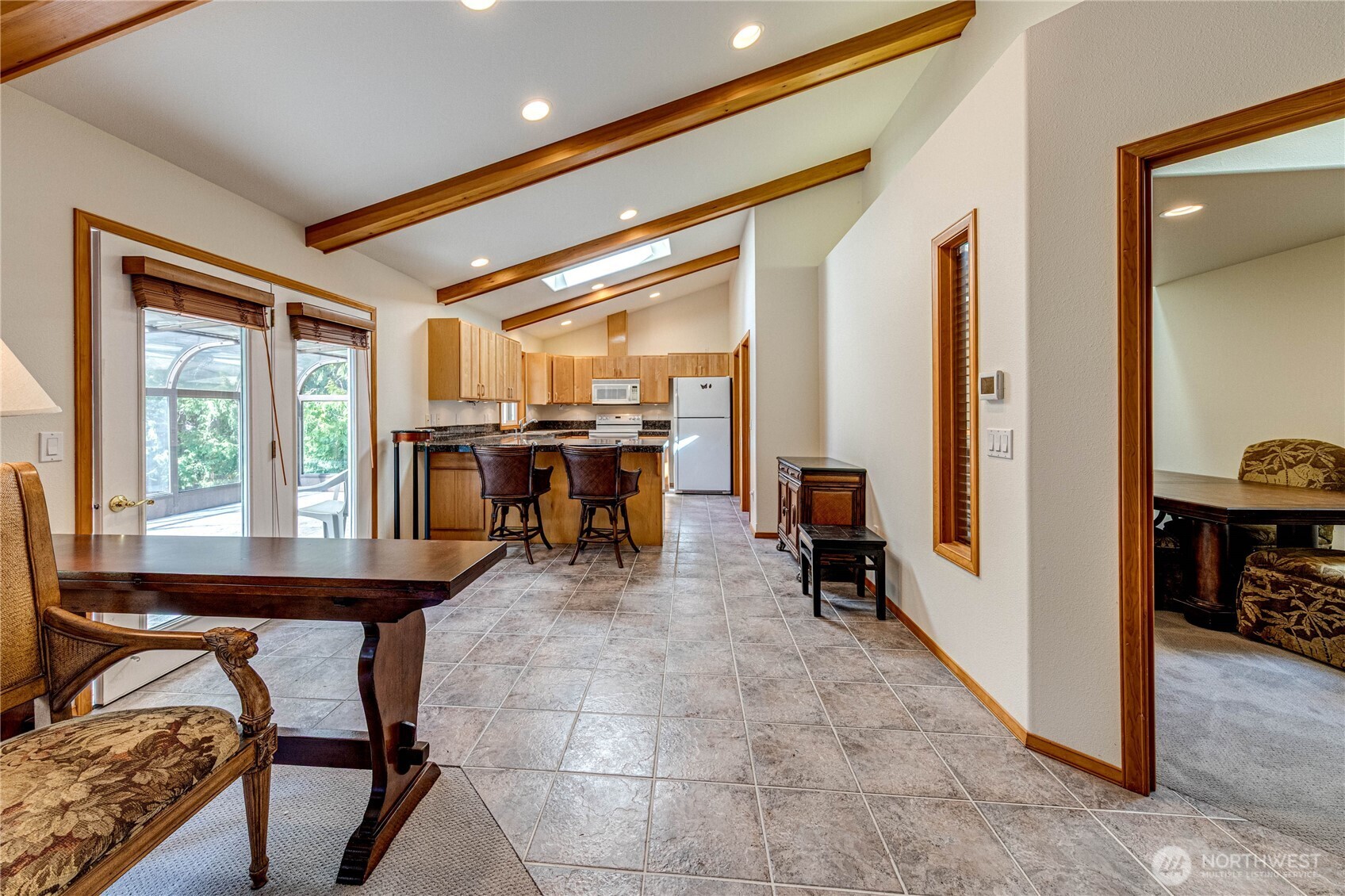 109 Vancouver Place Sequim, WA 98382 - Photo 9 of 40 a view of a dining room with furniture and a window